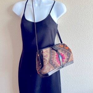 Aztec design woven jute and leather framed crossbody bag